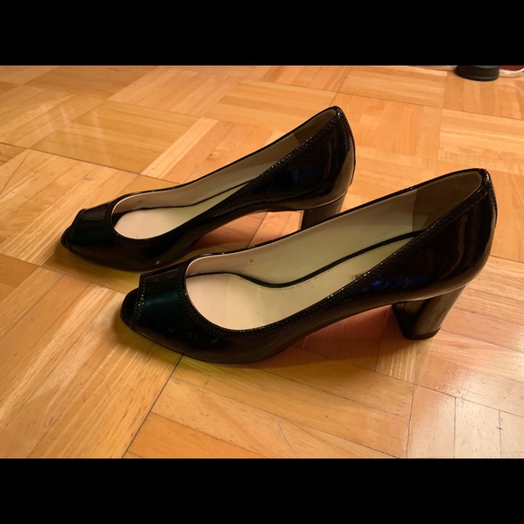 Prada black patent pumps